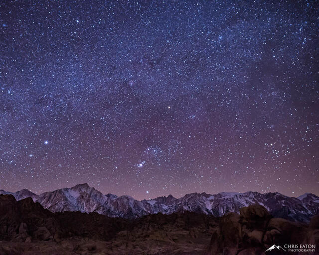 The Constellation Orion sets in the west behind Mt. Whitney and the Sierra Nevada Mountains.