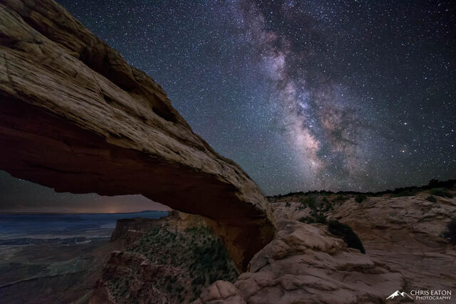 The Milky Way rises above Mesa Arch in Canyonlands National Park