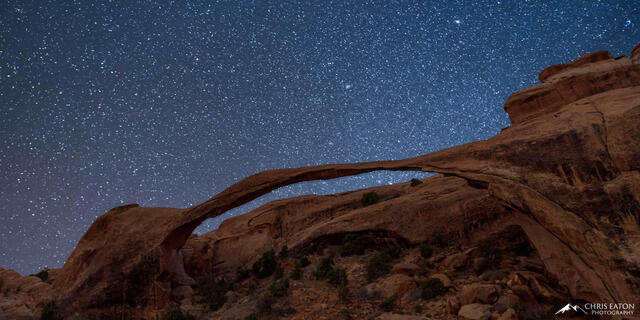 A starry night above Landscape Arch in Arches National Park.