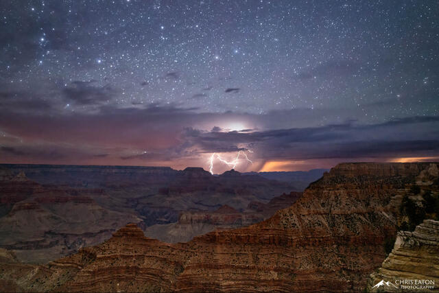 A distant midnight monsoon thunderstorm rumbles over the Grand Canyon.