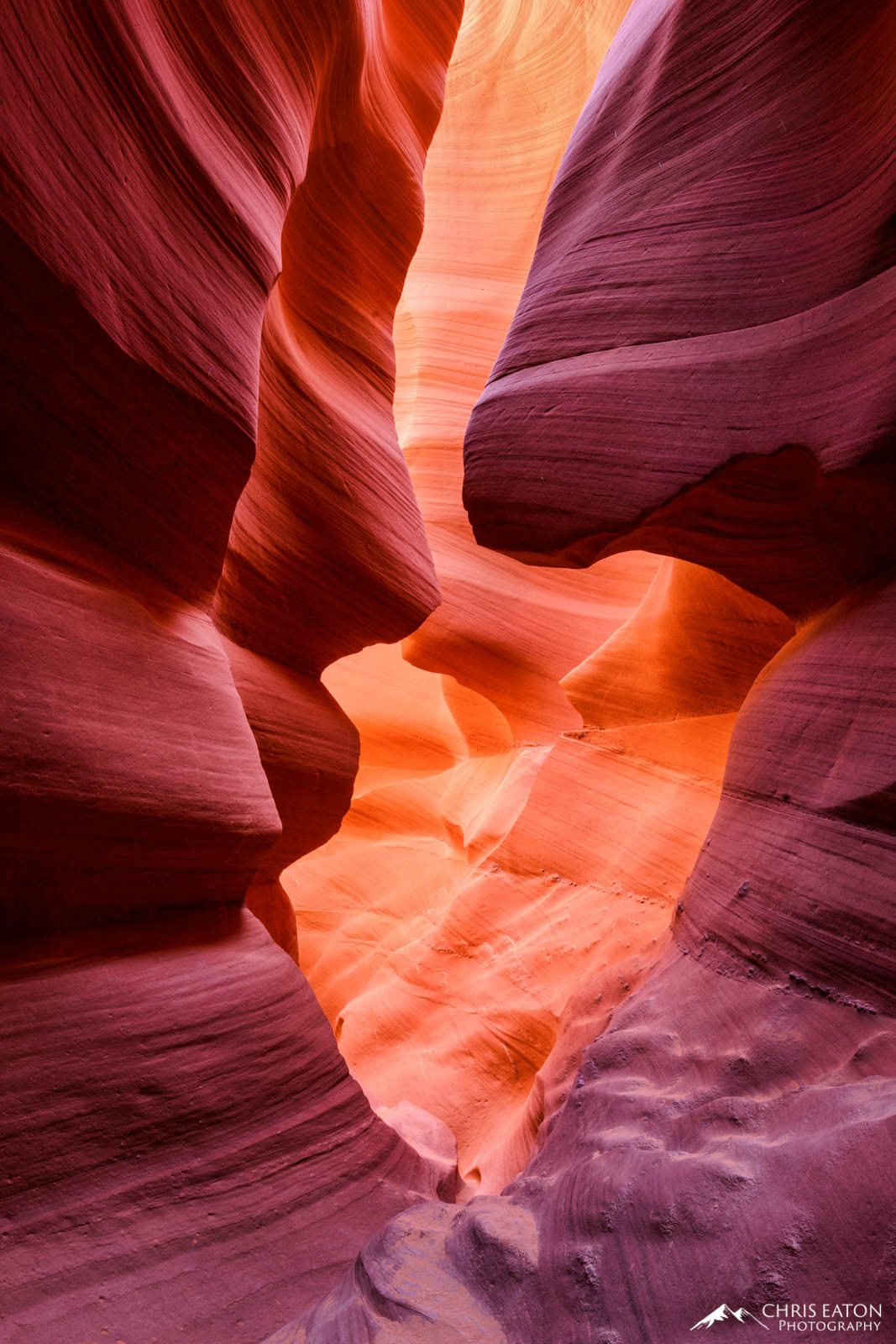 The narrow passages of Lower Antelope Canyon create layers of reflected light; the more the light reflects from wall-to-wall...