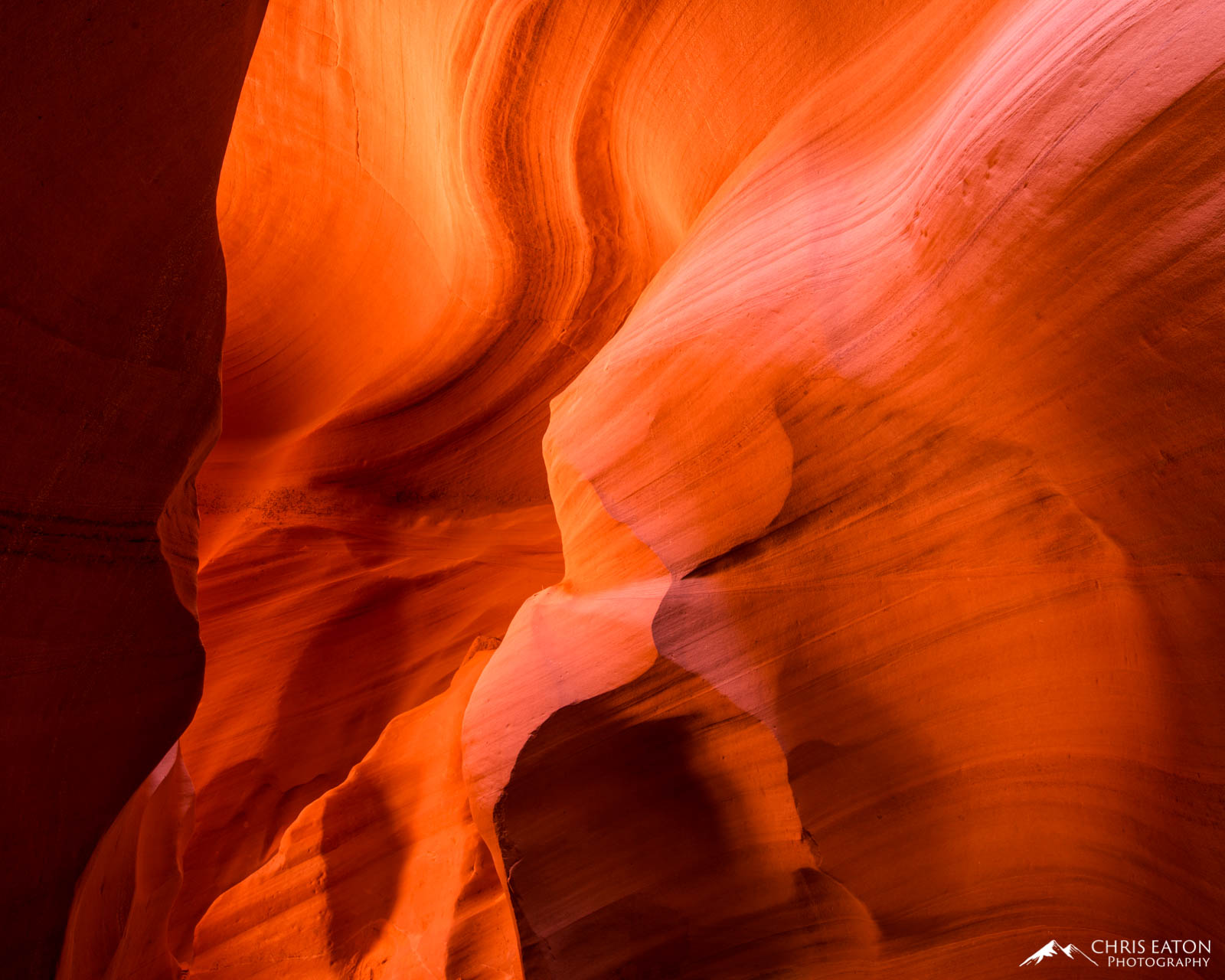 Canyon X is divided into two distinct slot canyons. While the lower canyon is deep where sunlight must reflect several times...