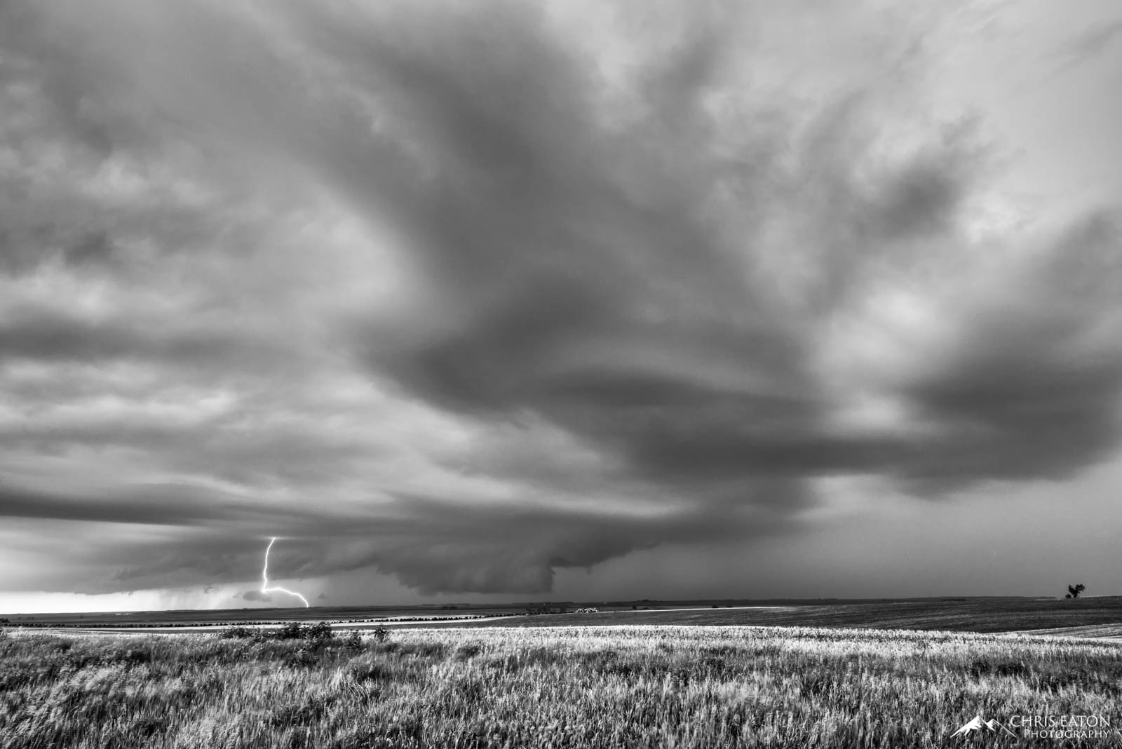 In late spring, a supercell thunderstorm builds over the Great Plains of the central United States. Supercell thunderstorms are...