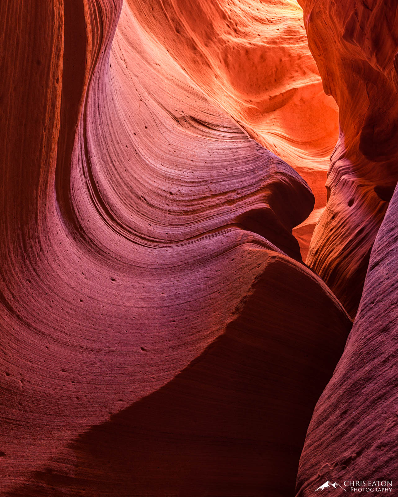 The flash floods that create and sculpt slot canyons, at times unwittingly recreate art. This section of Canyon X features a...