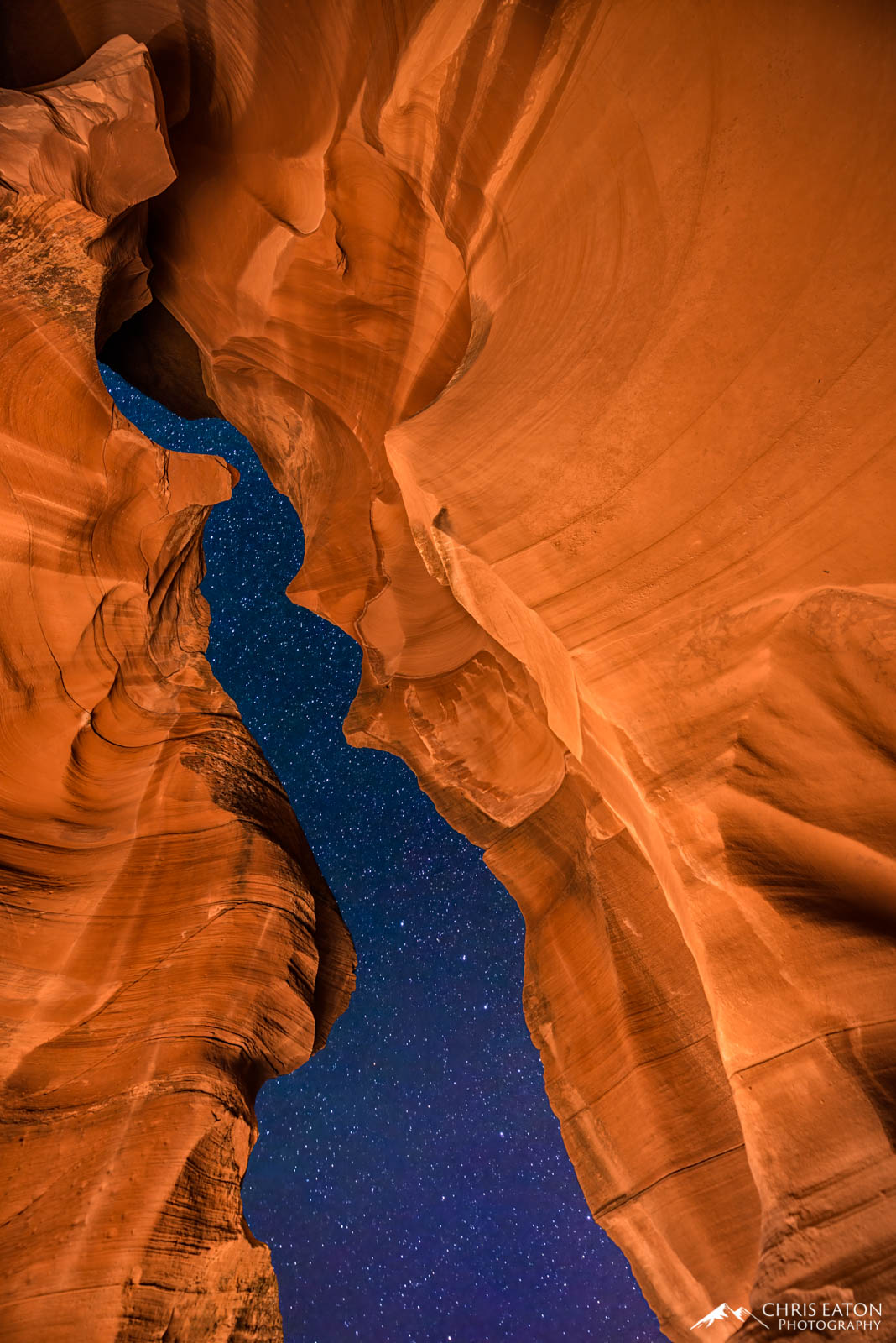 Antelope's Passage into Night A crack in Antelope Canyon reveals a night sky full of stars.