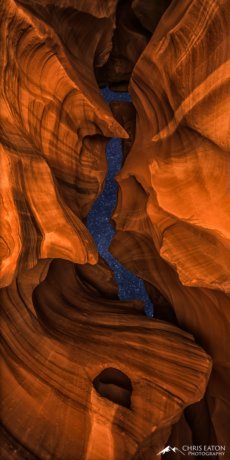 A night sky full of stars as seen through the narrow opening of Antelope Canyon.