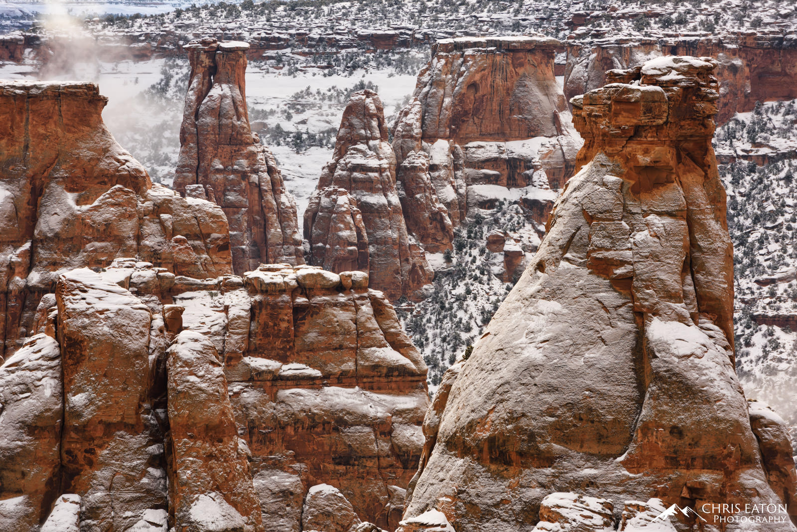 Frosted Monuments II The Pipe Organ, Independence Monument, and other formations in Monument Canyon are frosted with snow from an overnight storm...