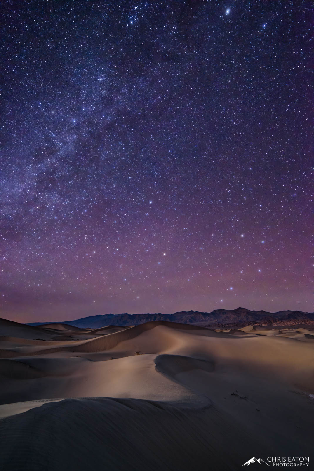 Midnight at Mesquite Flat Milky Way and Big Dipper over Mesquite Flat Sand Dunes in Death Valley National Park.