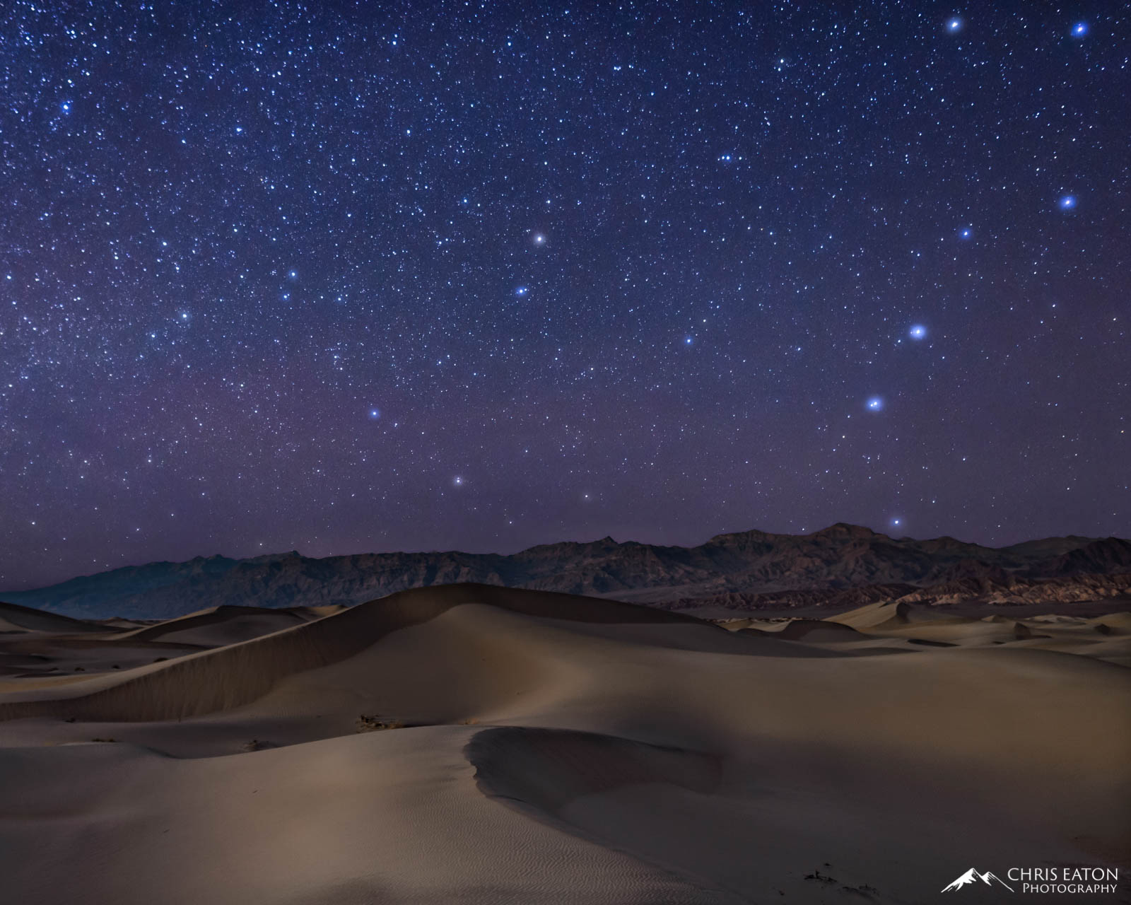 Big Dipper rising over Mesquite Flat Sand Dunes in Death Valley. National Park.