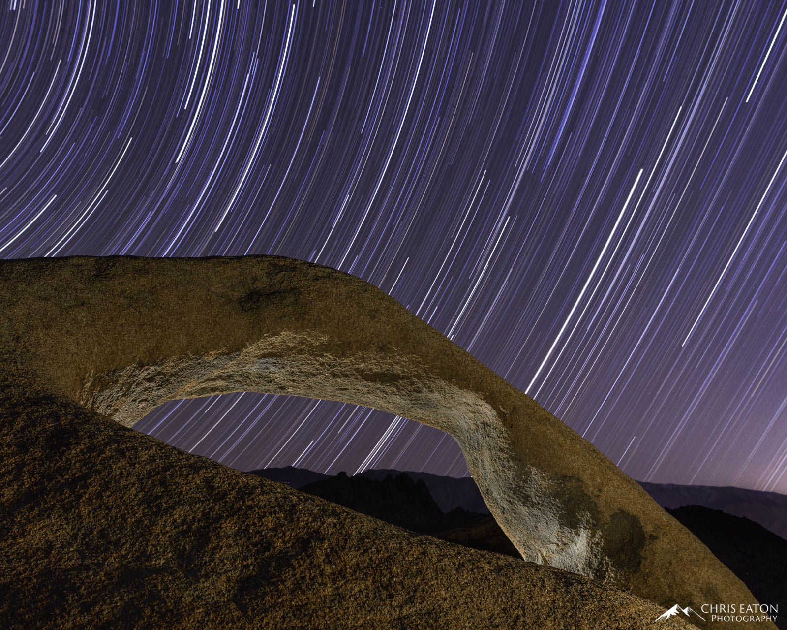 Star trails over Mobius Arch in the Alabama Hills of the Eastern Sierras.