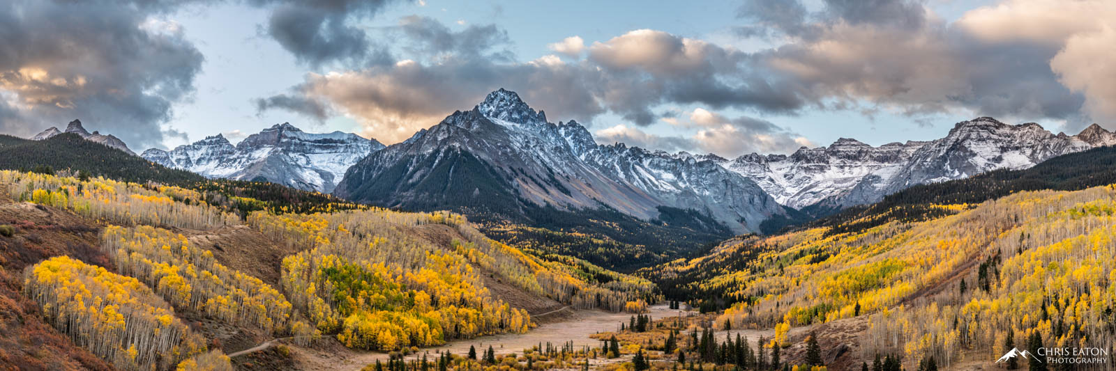 Mt. Sneffels, one of Colorado’s 14ers, rises sharply above a valley in its foothills. Every fall, the valley floor is surrounded...